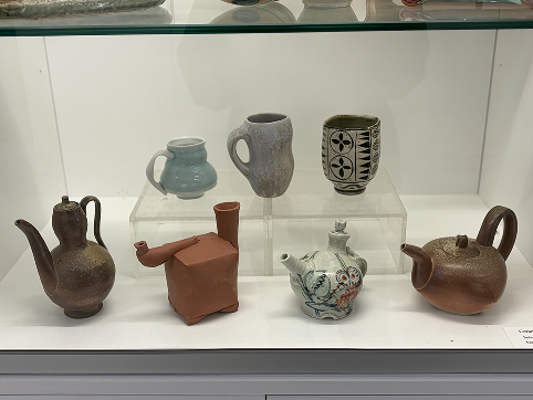 Ceremic mugs that are painted/ glazed. Created by the Ceramics, Honors Bachelor of Craft and Design program.